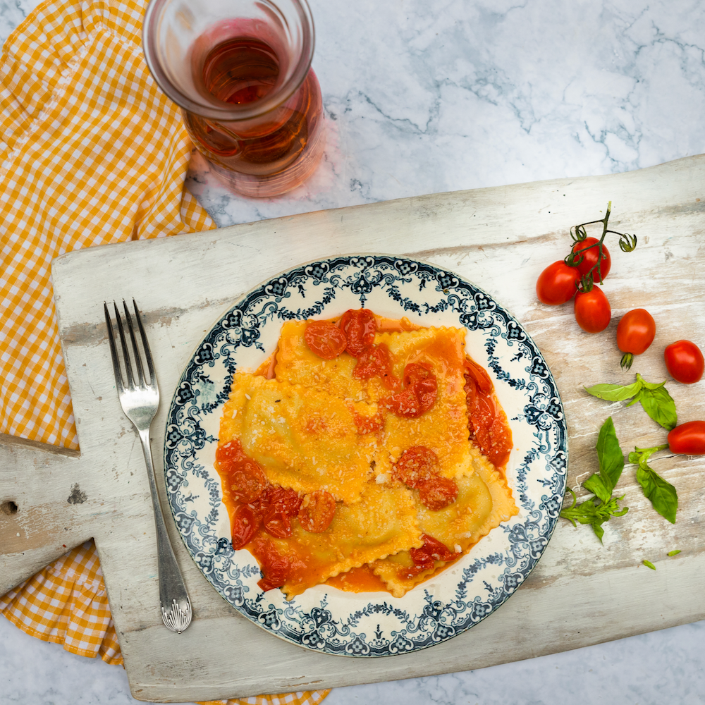 Aubergine, ricotta & basil ravioli with datterino tomato sauce