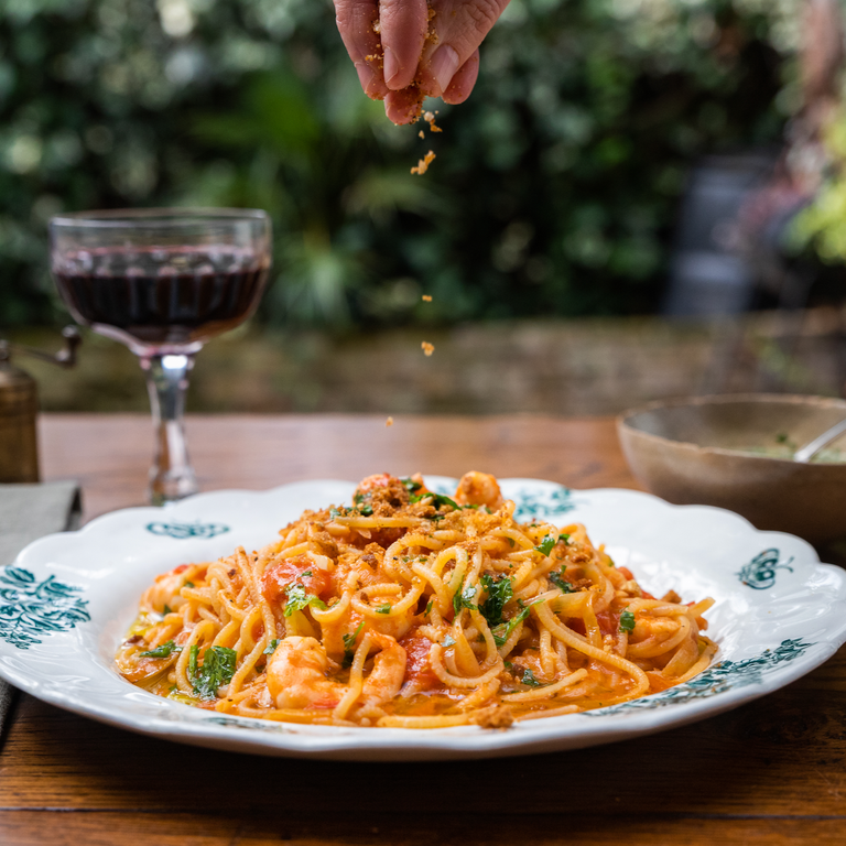 Spaghetti with prawns, langoustine sauce, pangrattato & parsley oil