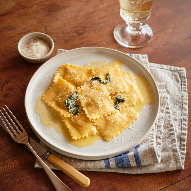Ham hock and prosciutto ravioli with sage butter