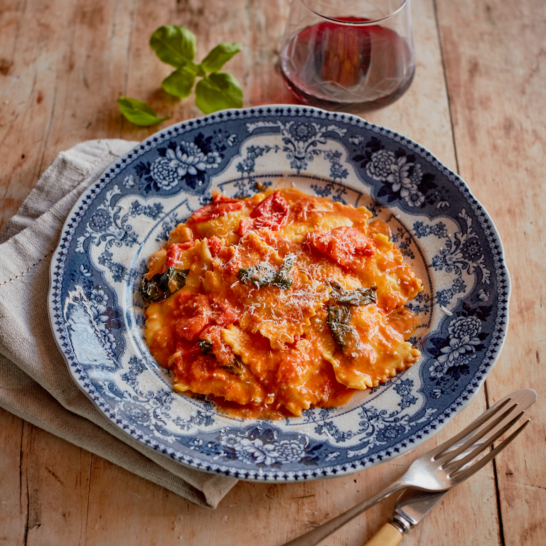 Herb & ricotta ravioli with slow cooked tomato & mascarpone.