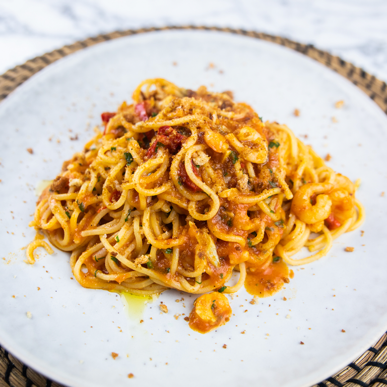 Spaghetti with prawns, langoustine, chilli pangrattato & parsley oil.